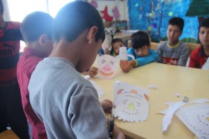 Children making masks for book characters/Read with Me in Ghaennat, Khorasan - Sep 2015