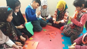 Children making crafts related to books - Read with Me in MahmoodAbad, Tehran - Jan 2016