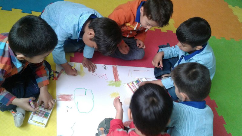 Children drawing book scenes - Read with Me in MahmoodAbad