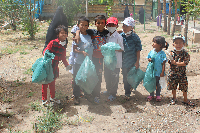 Children participating in litter pickup on World Environment Day - Read with Me in MahmoodAbad - June 2016