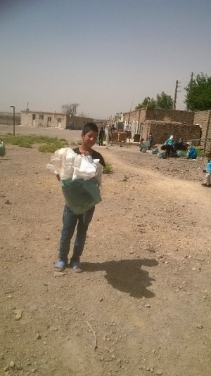 Children participating in litter pickup on World Environment Day - Read with Me in MahmoodAbad - June 2016