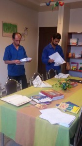 Workers looking at books in RWM Library - RWM in Sazvar Sazeh Company - June 2016