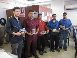Sazvar Sazeh Azarestan Workers receiving their prize for "Memorials of Reading with Each Other" photography competition
