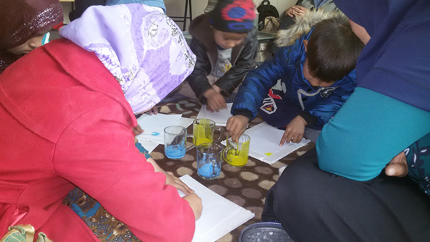 Children taking part in book related activities - Read with Me in Mazar-e-Sharif (2016)v